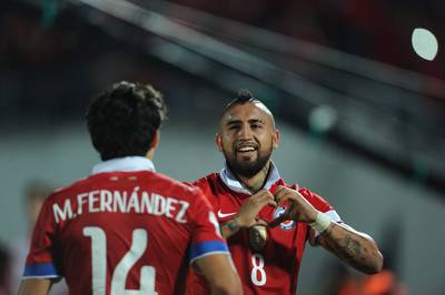 Chile’s Arturo Vidal celebrates his goal on Thursday night against Colombia during 2018 World Cup qualifying. Vladimir Rodas / AFP