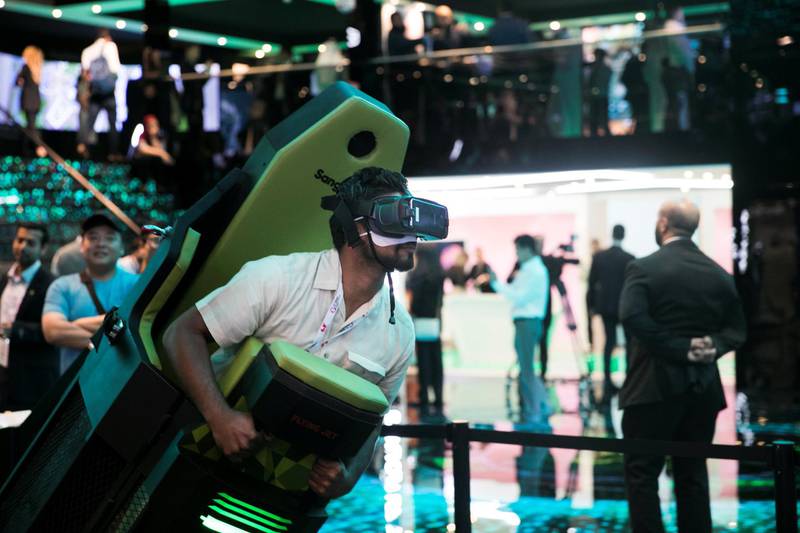 DUBAI, UNITED ARAB EMIRATES - OCTOBER 14, 2018. Visitors to Etisalat's booth experiencing a VR world at Gitex Technology Week at DWTC.(Photo by Reem Mohammed/The National)Reporter: Section:  NA