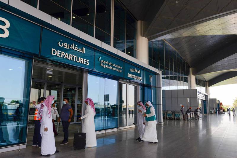 Saudi domestic passengers arrive at King Fahad International Airport in the Saudi Arabian capital.  AFP