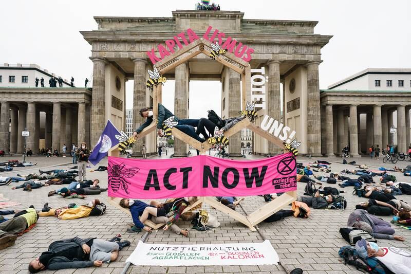 Extinction Rebellion demonstrate in front of the Brandenburg Gate. EPA