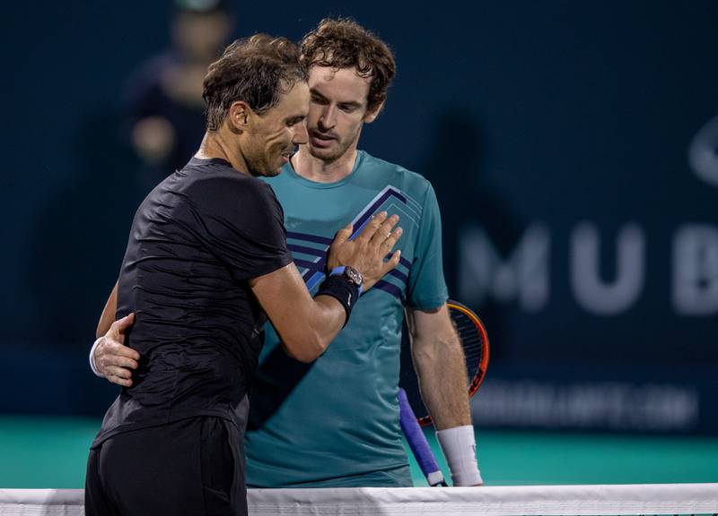 Rafael Nadal and Andy Murray greet each other at the net after their semi-final match at the Mubadala World Tennis Championship at Zayed Sprts City, Abu Dhabi on Friday, December 17, 2021. Victor Besa / The National