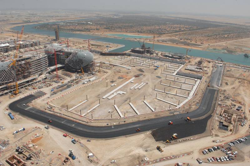 As the track is laid down in 2009, the marina slowly begins to take shape. Next, the remaining sand will be dug up and the area flooded with sea water. Courtesy Yas Marina Circuit