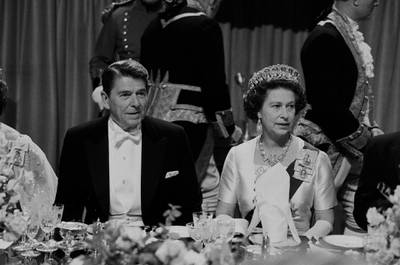 American politician Ronald Reagan (1911 - 2004), 40th President of the United States, and the Queen of the United Kingdom Elizabeth II at a gala dinner at Windsor Castle, UK, 9th June 1982. (Photo by McCarthy/Daily Express/Hulton Archive/Getty Images)