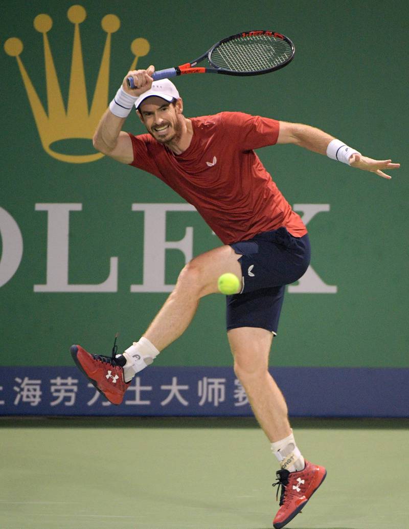 Andy Murray  hits a return against Fabio Fognini at the Shanghai Masters tennis tournament in Shanghai on Tuesday, October 8. AFP