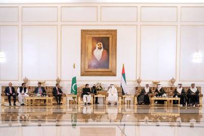 ABU DHABI, UNITED ARAB EMIRATES - September 19, 2018: HH Sheikh Mohamed bin Zayed Al Nahyan Crown Prince of Abu Dhabi Deputy Supreme Commander of the UAE Armed Forces (center R), receives HE Imran Khan Prime Minister of Pakistan (center L), during a reception at the Presidential Airport. Seen with HH Sheikh Abdullah bin Zayed Al Nahyan UAE Minister of Foreign Affairs and International Cooperation (R), HH Sheikh Hamed bin Zayed Al Nahyan, Chairman of the Crown Prince Court of Abu Dhabi and Abu Dhabi Executive Council Member (2nd R), HH Sheikh Mansour bin Zayed Al Nahyan, UAE Deputy Prime Minister and Minister of Presidential Affairs (3rd R), HH Lt General Sheikh Saif bin Zayed Al Nahyan, UAE Deputy Prime Minister and Minister of Interior (4th R) and members of the Pakistani delegation.

( Hamad Al Kaabi / Crown Prince Court - Abu Dhabi )
---