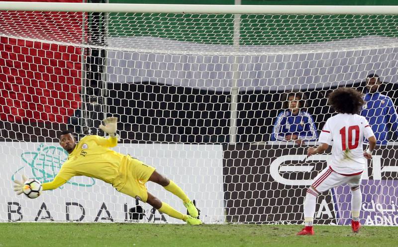 Oman goalkeeper Fayez Al Rusheidi saves Omar Abdulrahman's penalty in regulation time. Abdulrahaman would go on to be denied in the shoot-out as Oman won the Gulf Cup on penalties.  Yasser Al Zayyat / AFP