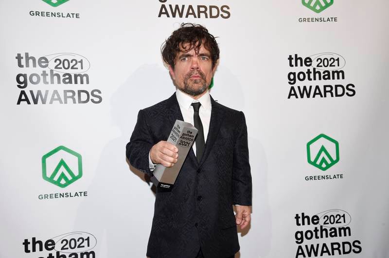 Peter Dinklage poses with the Performer Tribute Award. AP