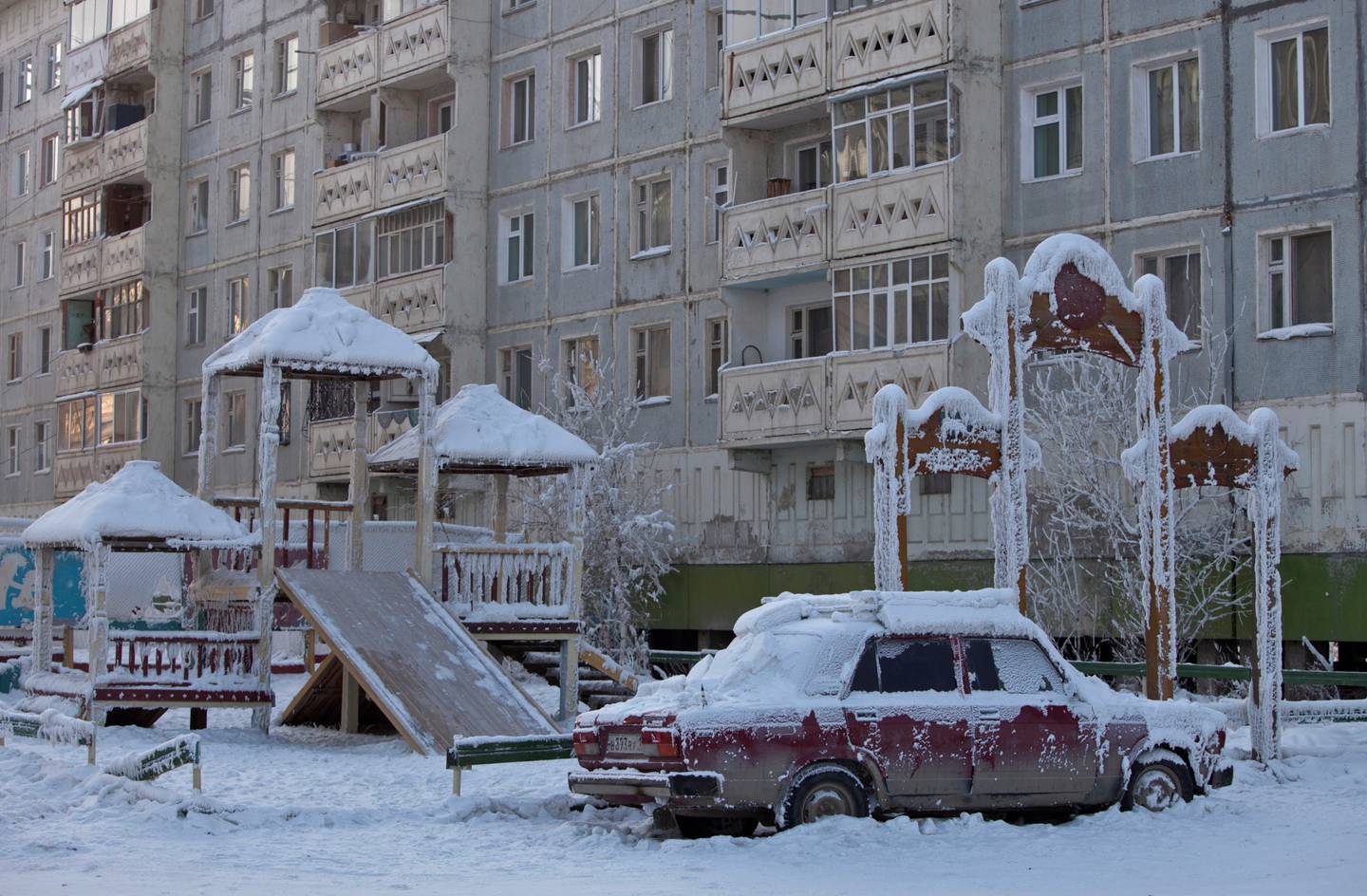 A car covered in ice is pictured near a playground in Yakutsk, in the Republic of Sakha in February 2013. Reuters