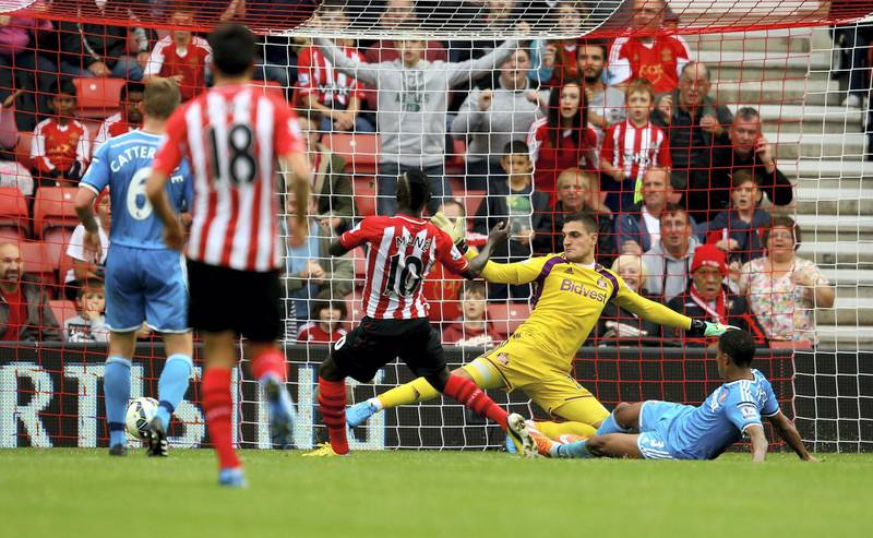 SOUTHAMPTON, ENGLAND - OCTOBER 18:  Sadio Mane of Southampton scores the 8th goal during the Barclays Premier League match between Southampton and Sunderland at St Mary's Stadium on October 18, 2014 in Southampton, England.  (Photo by Richard Heathcote/Getty Images)