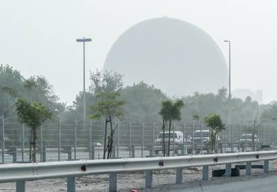 Hazy morning in Abu Dhabi where residents are used to a drier weather in July. Victor Besa / The National