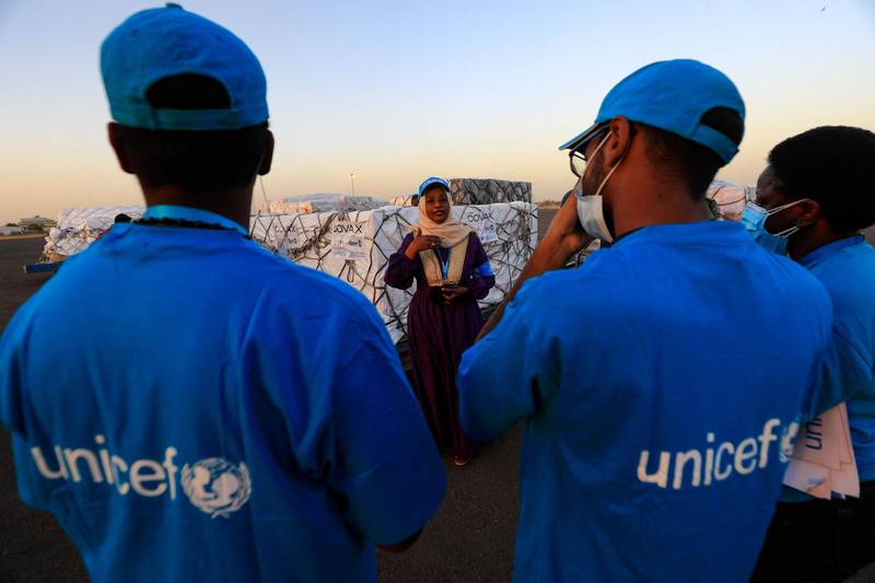 Unicef workers receive a briefing at Khartoum airport after the first shipment of Covid-19 vaccine arrives. AFP