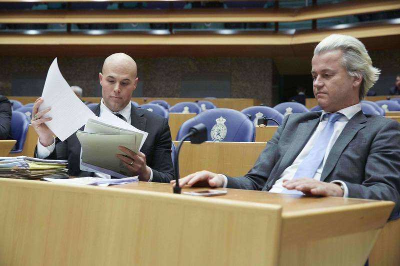 PVV party members Joram van Klaveren, left, and Geert Wilders, right. AFP