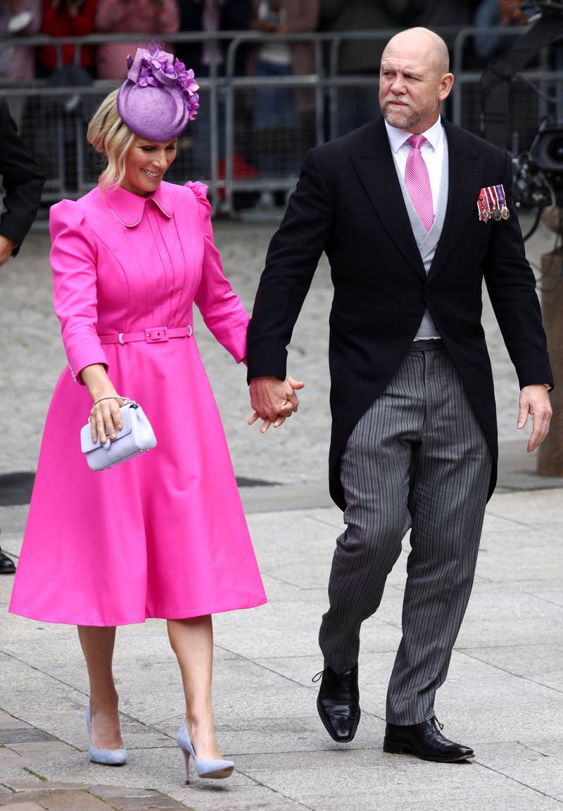 Zara and Mike Tindall arrive for the national service of thanksgiving. PA 