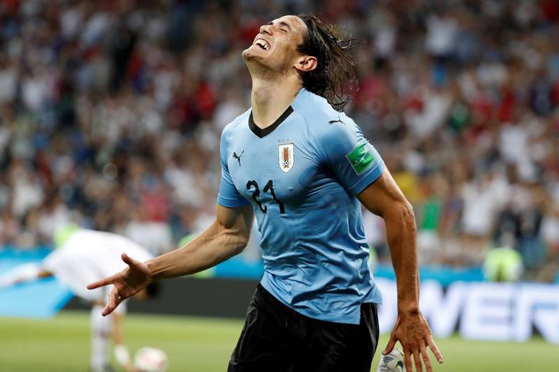 epa06853045 Uruguay's Edinson Cavani celebrates scoring the 1-0 lead during the FIFA World Cup 2018 round of 16 soccer match between Uruguay and Portugal in Sochi, Russia, 30 June 2018.

(RESTRICTIONS APPLY: Editorial Use Only, not used in association with any commercial entity - Images must not be used in any form of alert service or push service of any kind including via mobile alert services, downloads to mobile devices or MMS messaging - Images must appear as still images and must not emulate match action video footage - No alteration is made to, and no text or image is superimposed over, any published image which: (a) intentionally obscures or removes a sponsor identification image; or (b) adds or overlays the commercial identification of any third party which is not officially associated with the FIFA World Cup)  EPA/JUAN HERRERO   EDITORIAL USE ONLY