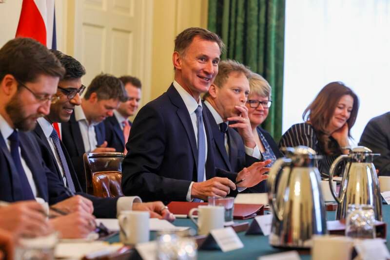Mr Hunt at a cabinet meeting before presenting his budget. Photo: No 10 Downing Street