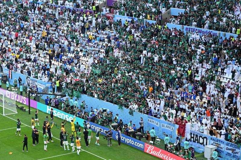 Saudi fans celebrate after their national team beat Argentina 2-1 in the World Cup at the Lusail Stadium in Qatar. AFP