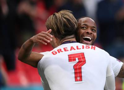 Sterling celebrates scoring with Jack Grealish. Reuters