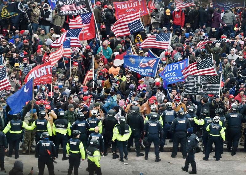 On January 6, 2021, Trump supporters clash with police and security forces as they storm the US Capitol in Washington. AFP