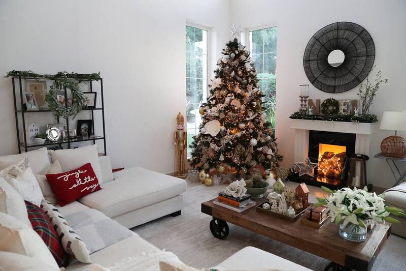 The living room houses the Christmas tree