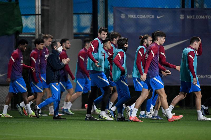 Barcelona players take part in a training session in Barcelona. AFP