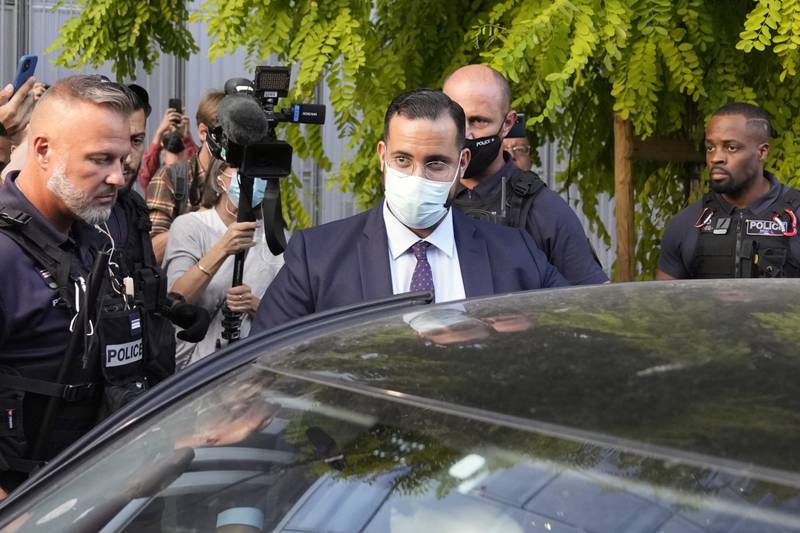 Alexandre Benalla, former security aide to French President Emmanuel Macron, leaves court on the first day of his trial in Paris on Monday. AP