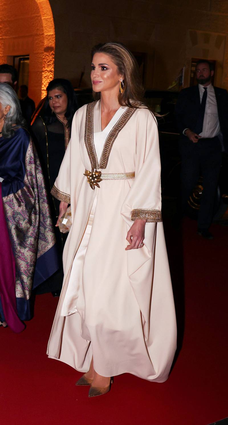 Queen Rania, wears a cream and gold abaya, during a private dinner at the Al Husseiniya Palace, in Amman, Jordan on November 16, 2021. Reuters