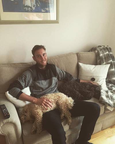Stuart Broad with his canine friends.