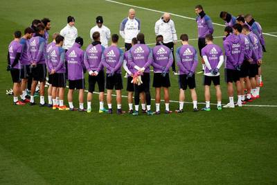Real Madrid’s players observe a minute of silence at training on Tuesday for Chapecoense. Juan Medina / Reuters