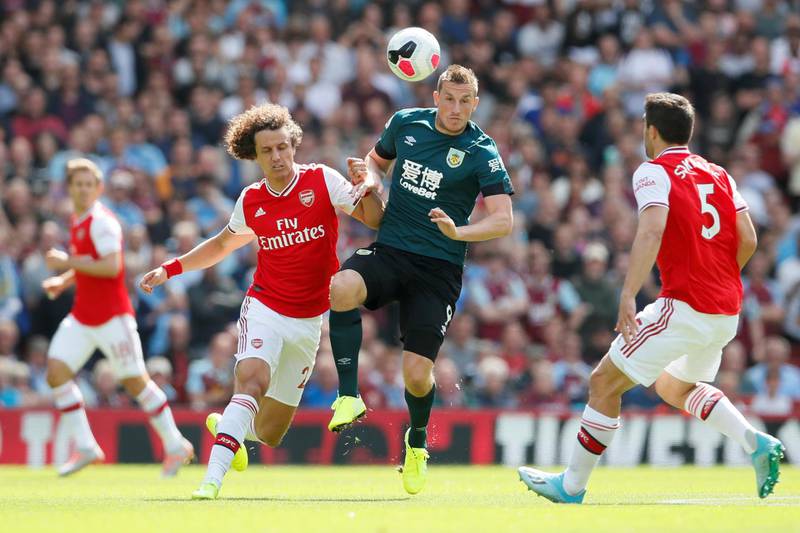 Arsenal's David Luiz in action with Burnley's Chris Wood during Arsenal's 2-1 Premier League win at the Emirates last week. Reuters