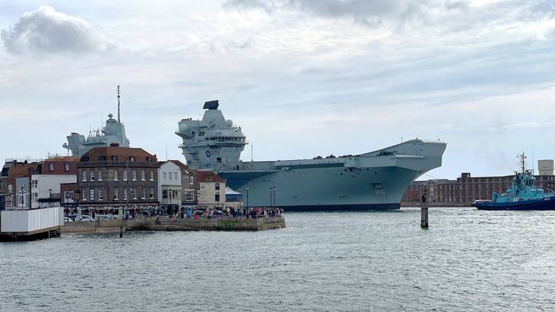 'HMS Prince of Wales' returns to Portsmouth Naval Base after breaking down off the Isle of Wight. PA