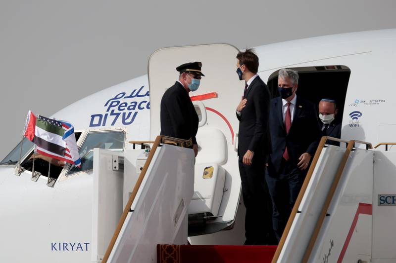 Senior White House adviser Jared Kushner, US National Security Adviser Robert O'Brien and Israeli National Security Adviser Meir Ben-Shabbat disembark a plane after landing at Abu Dhabi International Airport. Reuters