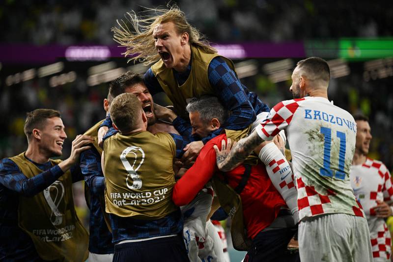 Croatia's Bruno Petkovic is mobbed after scoring against Brazil. Reuters
