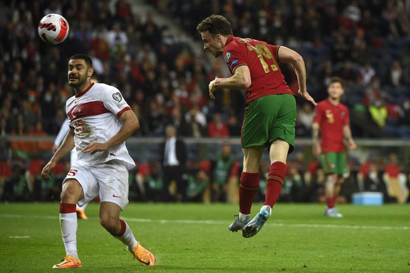 Diogo Jota heads home Portugal's second goal. AFP