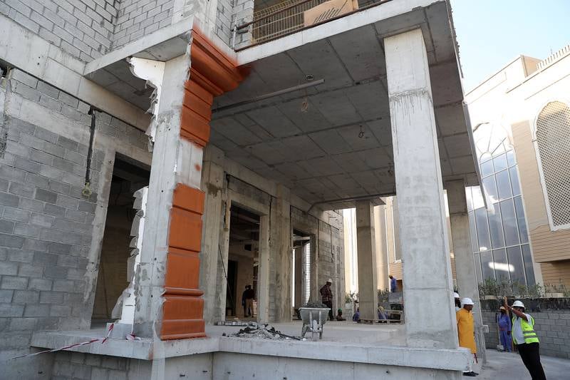 The temple's main entrance is beginning to take shape. Pawan Singh / The National