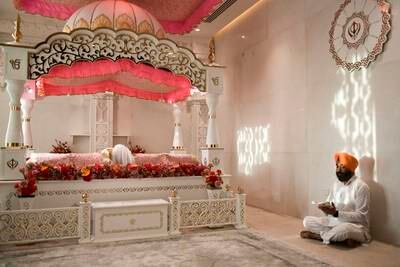 A shrine where the Sikh holy book is placed upstairs in the main prayer hall.  Khushnum Bhandari / The National
