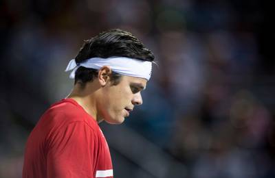 Milos Raonic of Canada reacts during his match against Adrian Mannarino of France during the Rogers Cup menâ€™s tennis tournament, Wednesday, Aug. 9, 2017 in Montreal. (Paul Chiasson/The Canadian Press via AP)