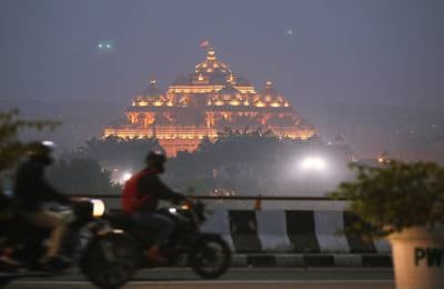 The Swaminarayan Akshardham temple is engulfed in a thick layer of smog as air quality hits the ' very poor ' category in New Delhi. EPA