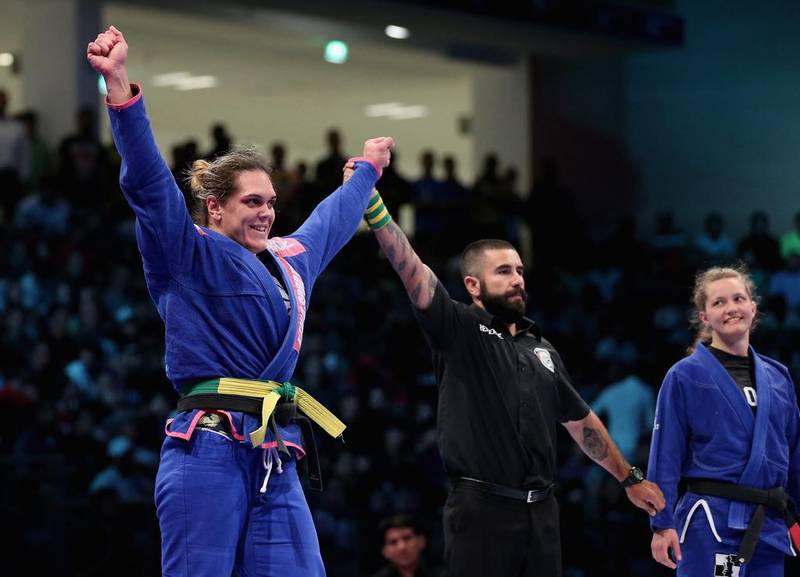 Gabriela Garcia of Brazil celebrates after winning against Janni Larsson of United States in the women's brown black belt open weight finals during the Abu Dhabi World Professional Jiu-Jitsu Championship at First Gulf Bank Arena. Francois Nel / Getty Images