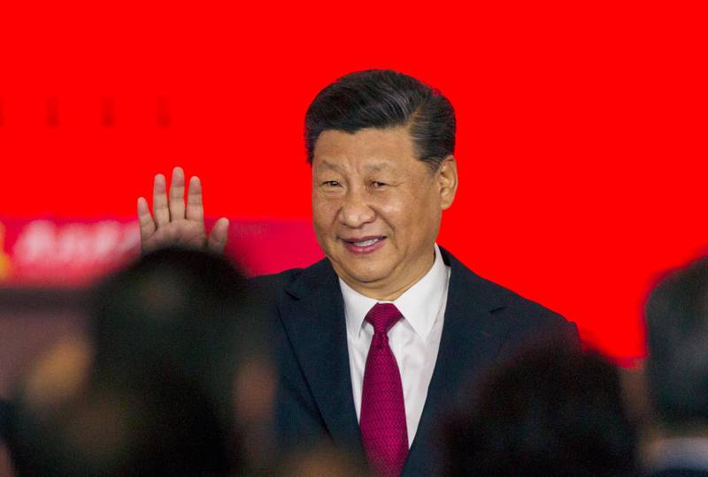 Chinese President Xi Jinping waves during the opening ceremony. EPA