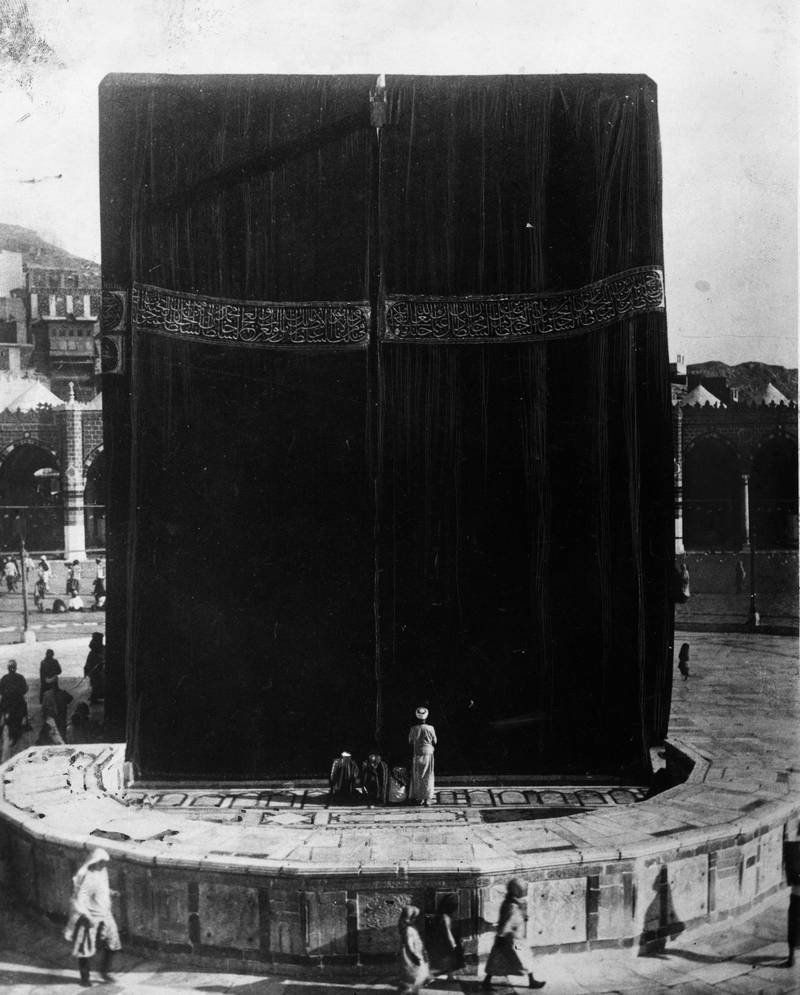 The Kaaba at the Grand Mosque in Makkah in March 1933. According to Muslim tradition, pilgrims who can gain access to the Kaaba's black stone stop to kiss it while performing Hajj.