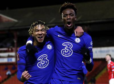 Chelsea's Tammy Abraham (right) celebrates with team-mate Reece James after scoring their side's first goal of the game during the Emirates FA Cup fifth round match at Oakwell, Barnsley. Picture date: Thursday February 11, 2021. PA Photo. See PA story SOCCER Barnsley. Photo credit should read: Martin Rickett/PA Wire. RESTRICTIONS: EDITORIAL USE ONLY No use with unauthorised audio, video, data, fixture lists, club/league logos or "live" services. Online in-match use limited to 120 images, no video emulation. No use in betting, games or single club/league/player publications.