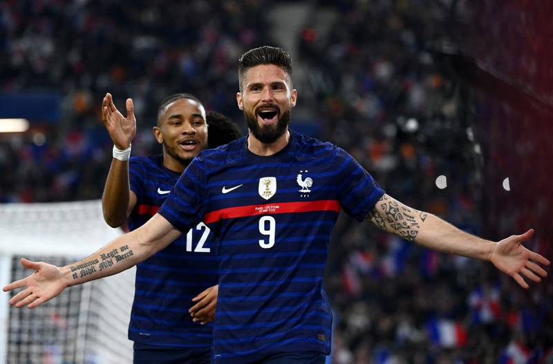 France's forward Olivier Giroud celebrates after scoring in a friendly match against Ivory Coast at the Velodrome Stadium in Marseille. AFP
