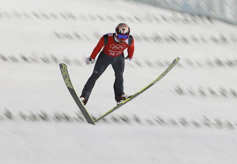 Taku Takeuchi of Japan in action during the training session for the ski Jumping event at the RusSki Gorki Jumping Centre at the Sochi 2014 Winter Olympics in Krasnaya Polyana on Sunday. Valdrin Xhemaj / EPA   