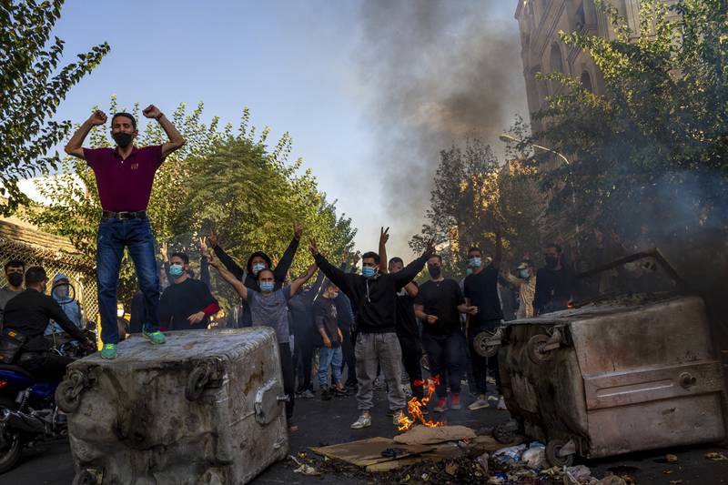Iranians protest in Tehran after the death of 22-year-old Mahsa Amini after she was detained by the morality police in September. AP Photo