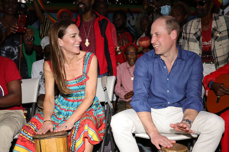 Prince William and Kate display their drumming skills at the museum. Reuters