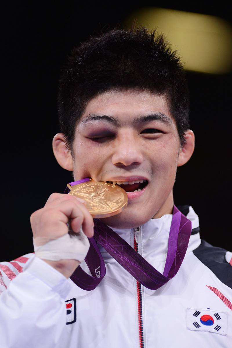 LONDON, ENGLAND - AUGUST 07:  Gold medalist Hyeonwoo Kim of Korea in the Men's 66kg Greco-Roman Quarter-Final on Day 11 of the London 2012 Olympic Games at ExCeL on August 7, 2012 in London, England.  (Photo by Mike Hewitt/Getty Images) ***BESTPIX*** *** Local Caption ***  149944878.jpg