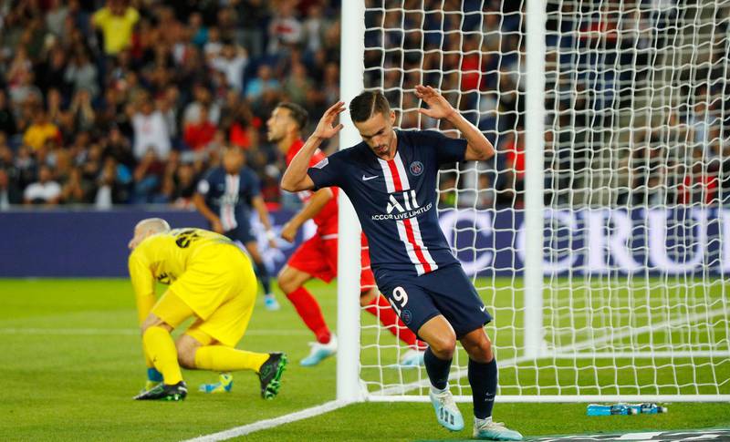 PSG's Pablo Sarabia reacts after missing a chance against Nimes. AP Photo