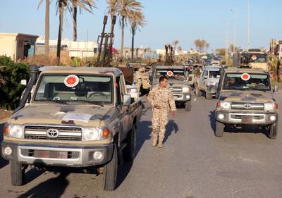 Military vehicles of Misrata forces, under the protection of Tripoli's forces, are seen on a street in Tajura neighborhood, east of Tripoli, Libya. Reuters