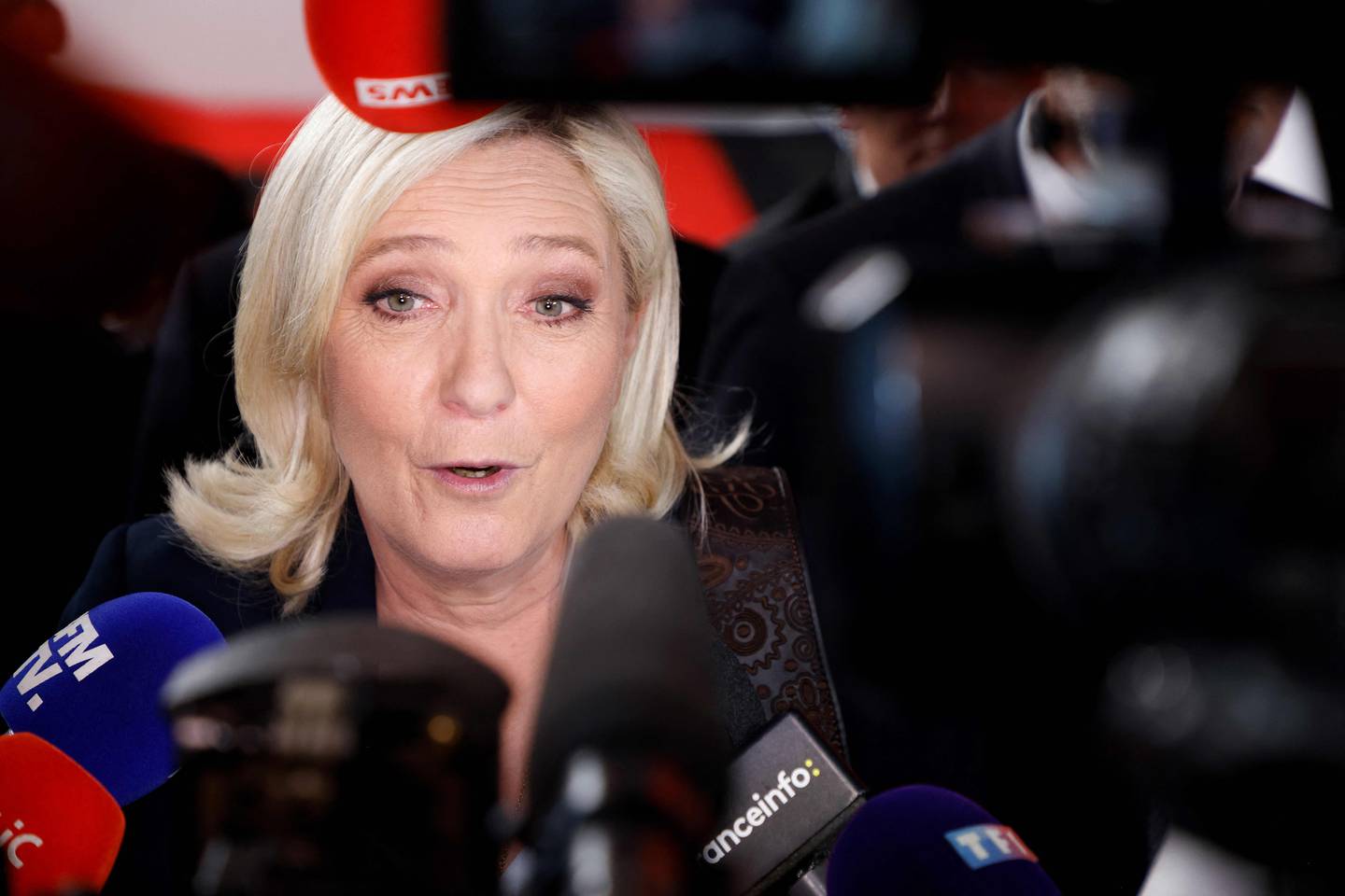 Marine Le Pen speaks to the press after a live televised debate with Emmanuel Macron, in Saint-Denis. AFP