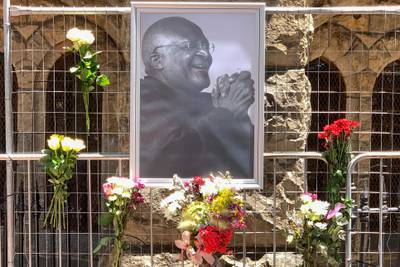 A portrait of Desmond Tutu outside St George's cathedral in Cape Town. AFP